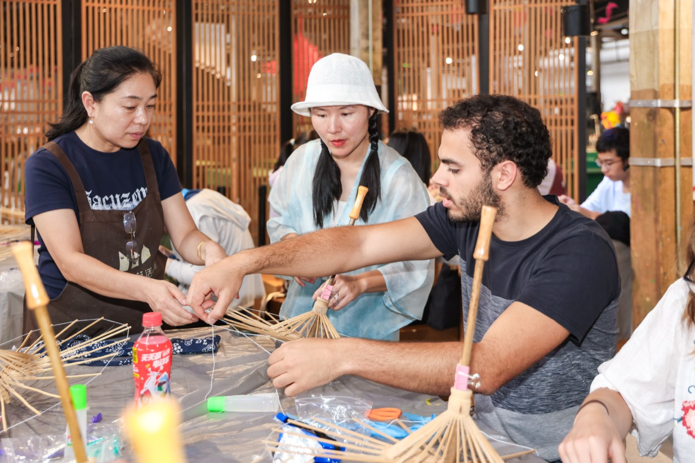 Traditional umbrella-making experience on Xiaohe Historic Street